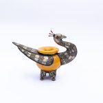 Moroccan Flight: Engraved Metal and Ceramic Bird-Shaped Ashtray